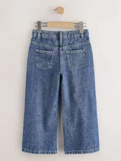 Clearance Next Bleu moyen - Jean orné d’un large imprimé fleuri (3-16ans) Coupe large
