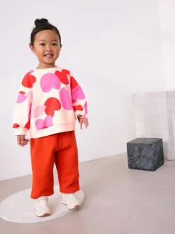 Best Next - Ensemble Sweat-shirt et jogging Coupe ballon (3mois -7ans) Rose/rouge motif cœurs